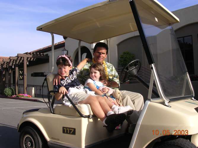 Rocky with Cody and Kylie in Golf Cart